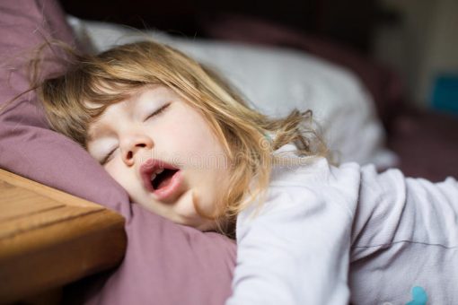 Child sleeping with mouth open
